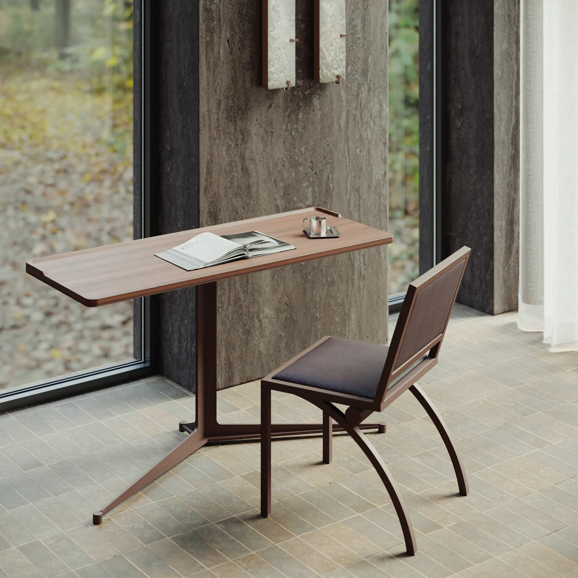 Pupitre desk and chair beside a window in a quiet study setting