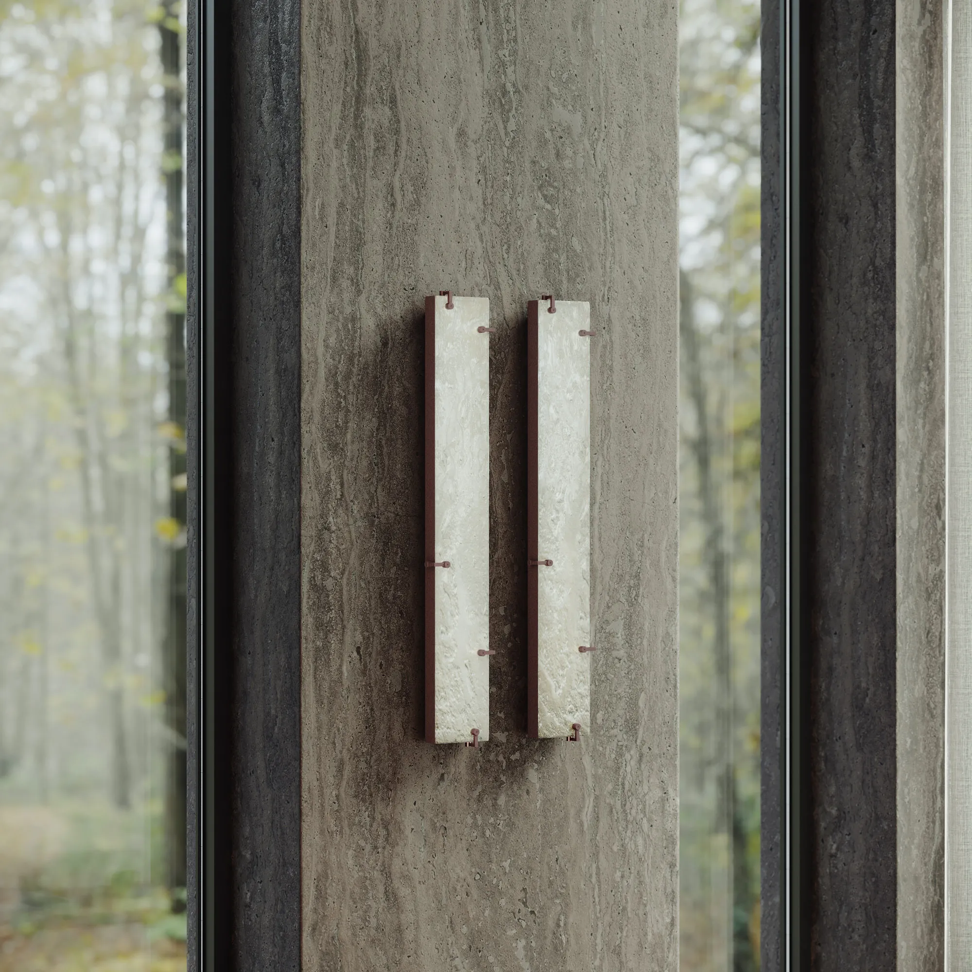 Two Agraphe wall lamps between full-height windows overlooking woodland